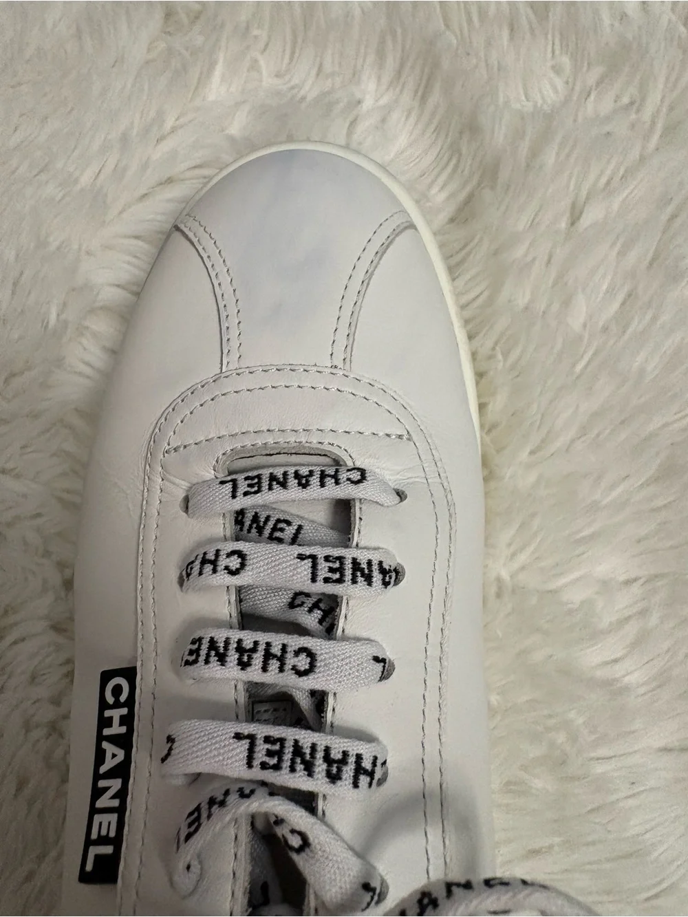 CHANEL White and Black Logo Lace-Up Sneakers